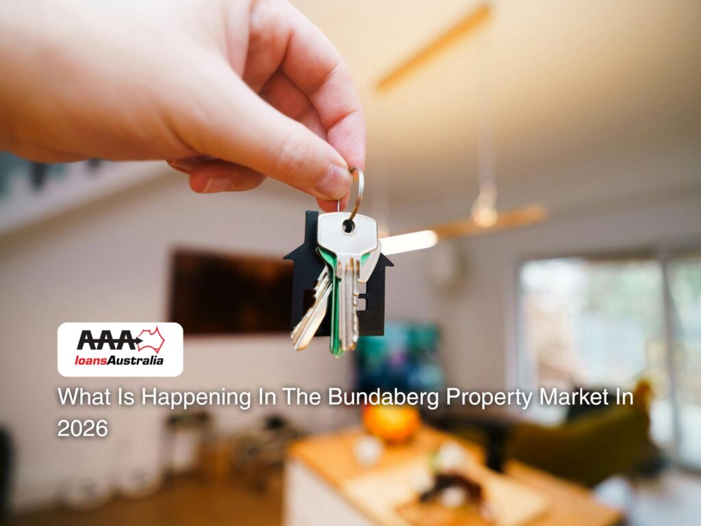 Buyer receiving house keys after securing a home loan in a regional property market