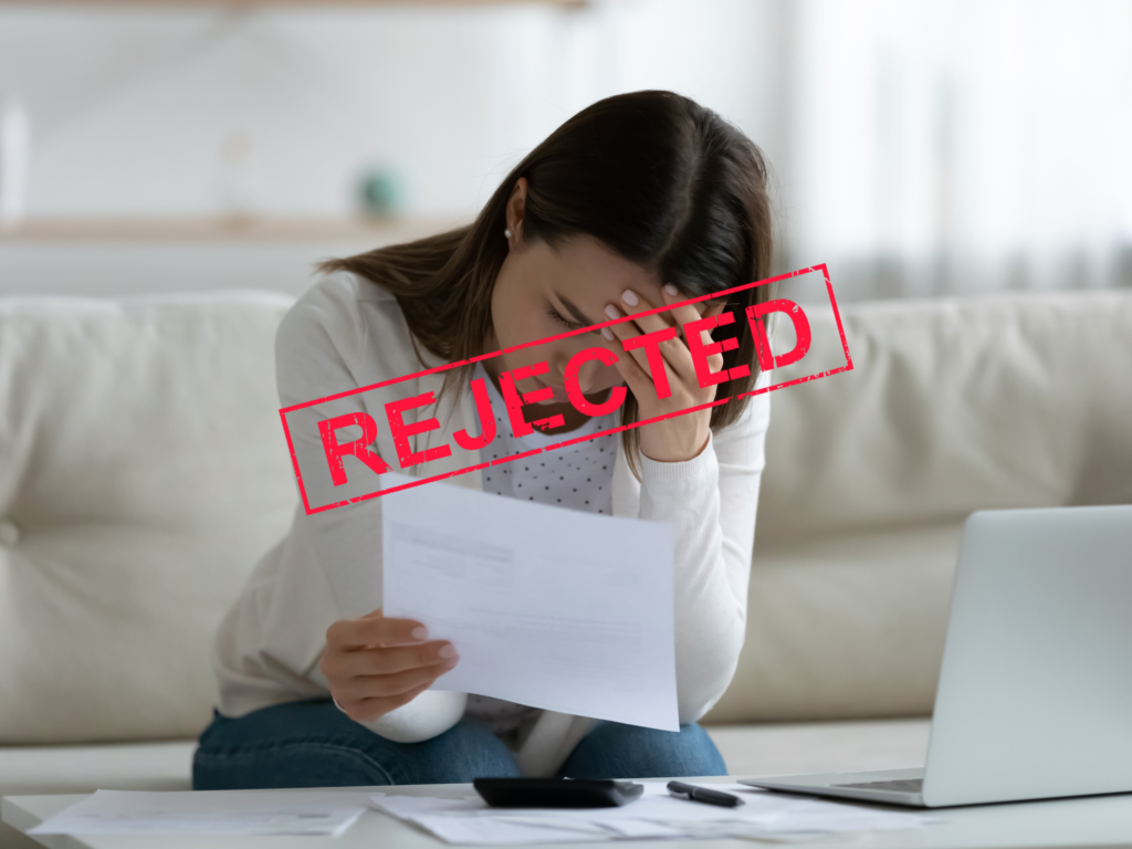 A woman receiving a rejection letter by the bank in Bundaberg