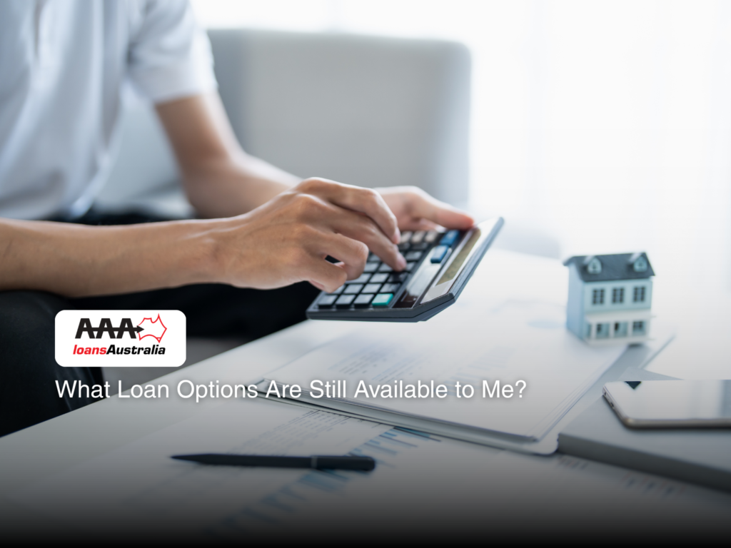 A person calculating home loan options in Bundaberg