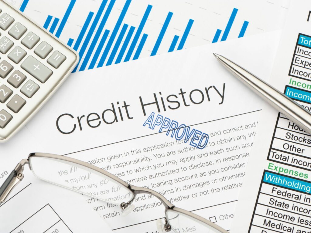 Person reviewing monthly expenses and existing debts to assess borrowing power